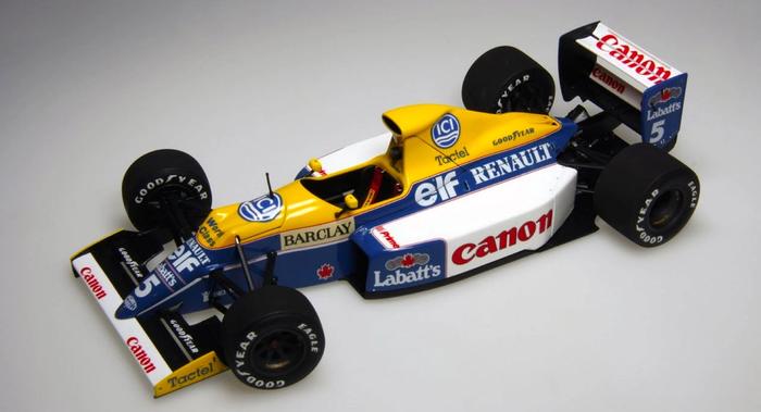 Williams FW-13B 1990 product image of a blue, yellow, and white model F1 car.