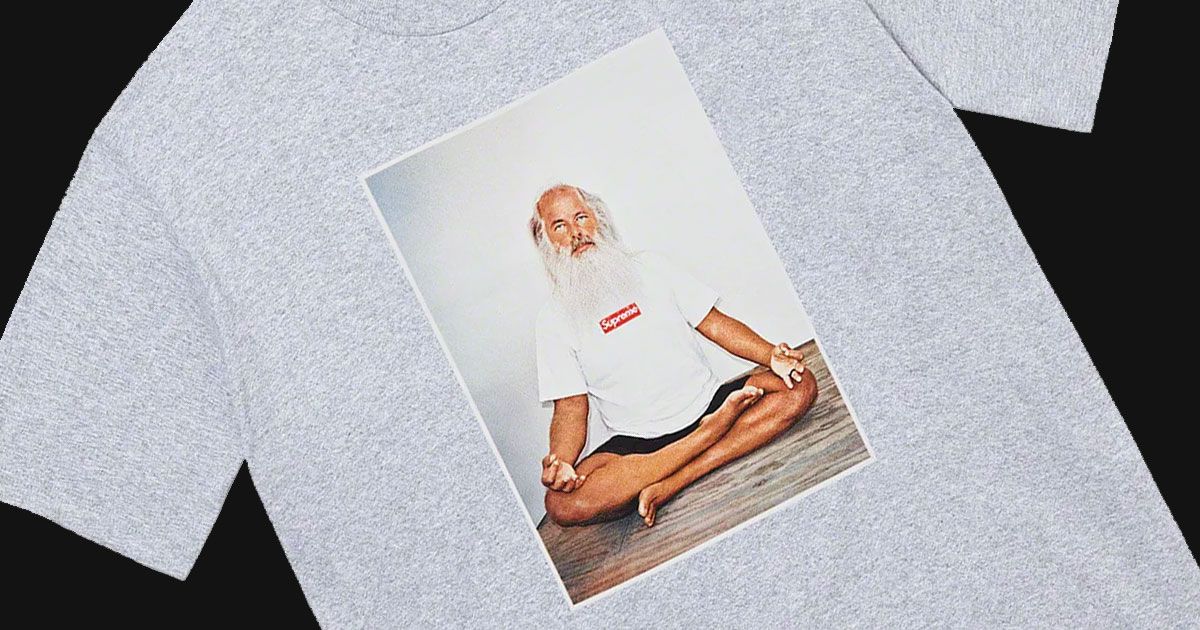 Image of a grey tee with Rick Ruben in a Supreme box logo tee on a whitebackground.