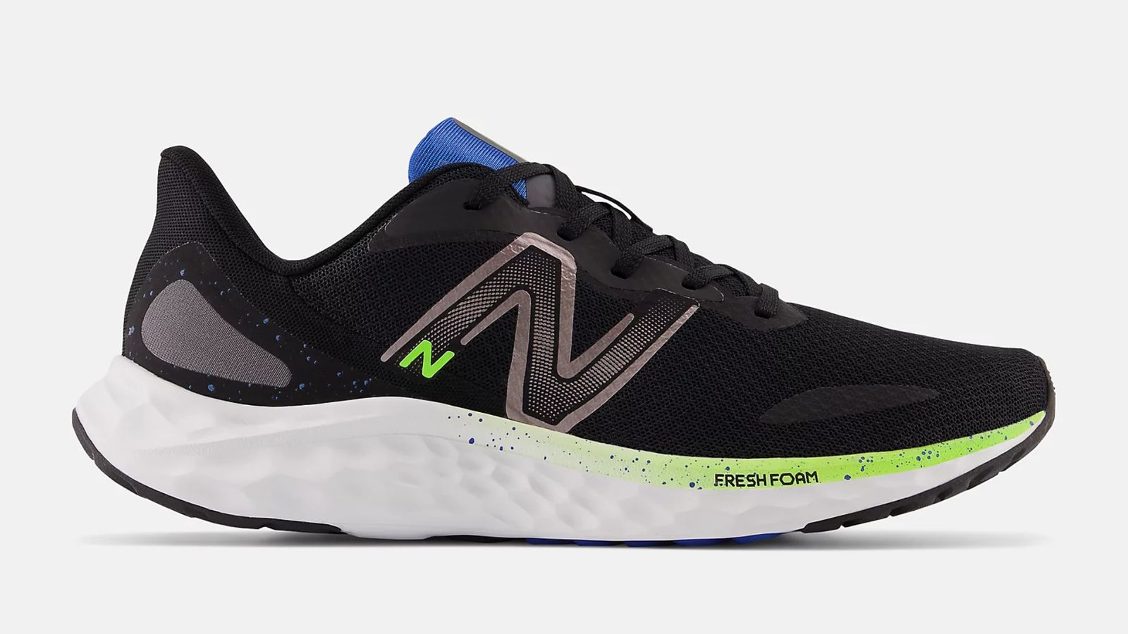 New Balance Arishi V4 product image of a black running shoe with a white midsole featuring a blue tongue and light green details.
