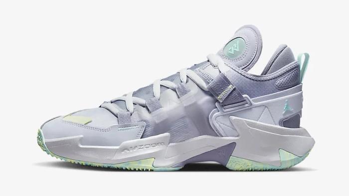 Best Jordan for basketball - Jordan Why Not .5? product image of a silver and indigo sneaker with light blue and green details.