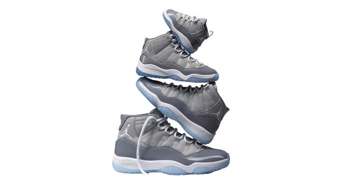 Air Jordan 11 Cool Grey product image of a grey sneakers stacked on top of eachother.