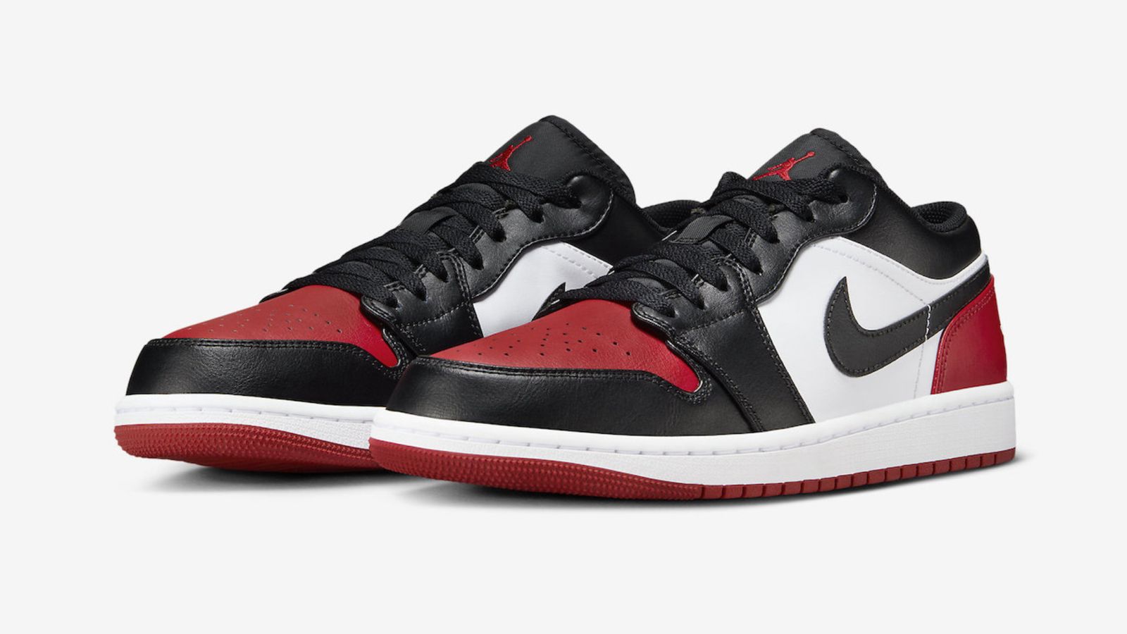 Air Jordan 1 Low "Bred Toe 2.0" product image of a white, black, and red leather Jordan 1 Low.