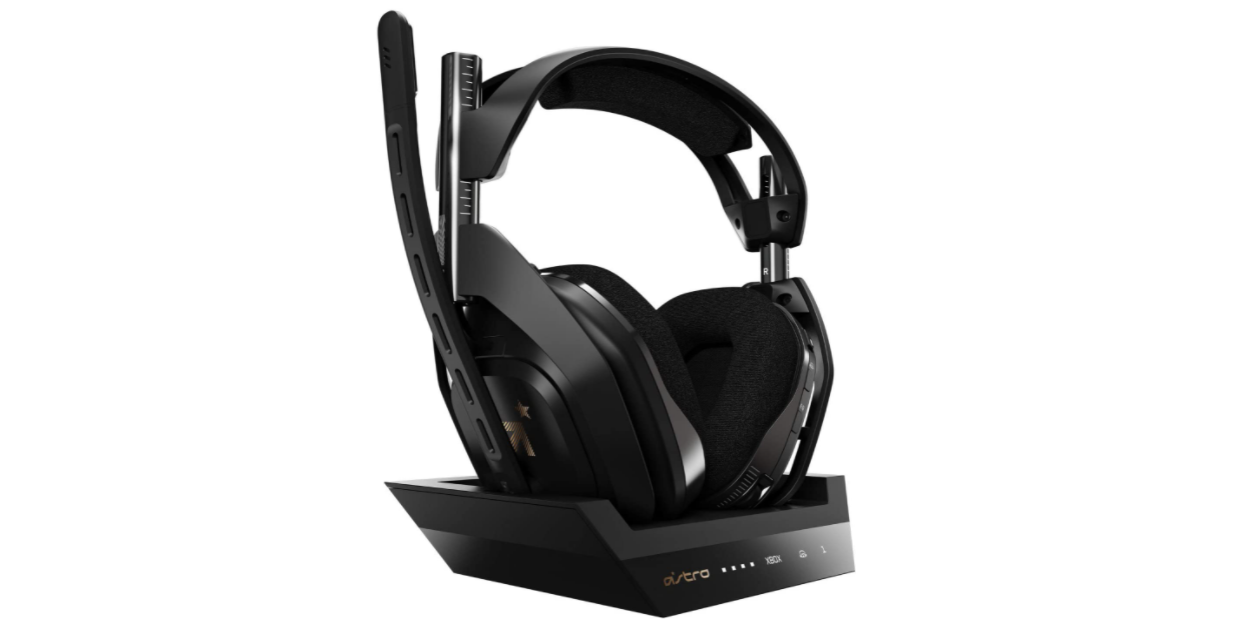 Best headset for Battlefield 2042 ASTRO Gaming product image of a black headset with gold details, sat on a black stand.