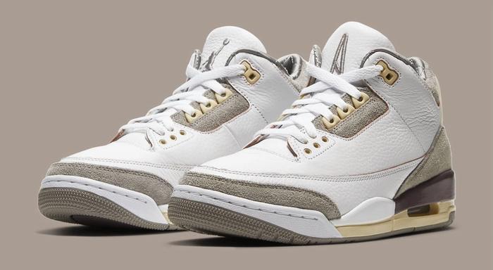 Best Air Jordan 3 colorways A Ma Maniére collaboration product image of a pair of sail coloured sneakers with burgundy details.