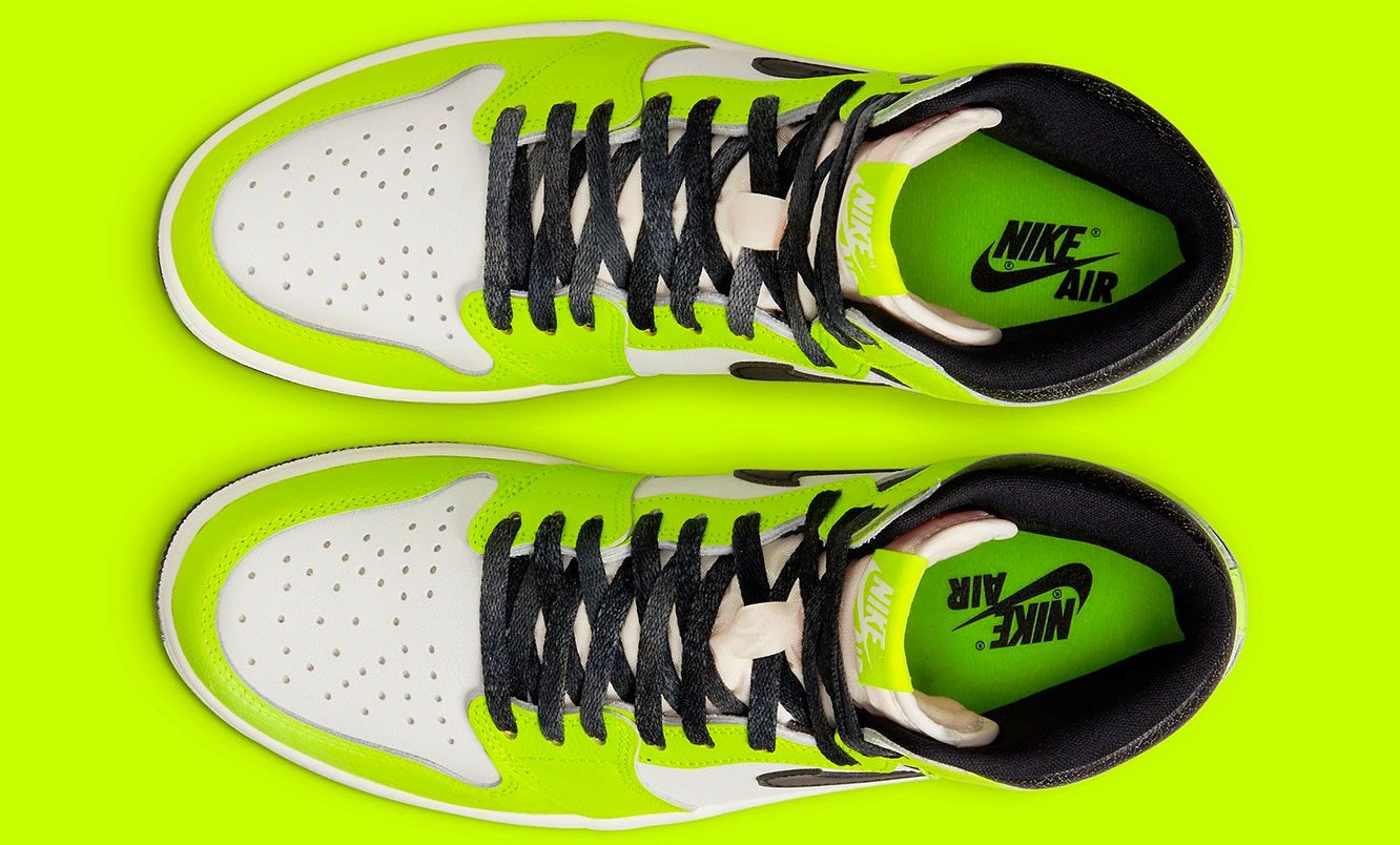 Air Jordan 1 High OG "Visionaire" product image of a white and black sneaker with neon yellow overlays. 