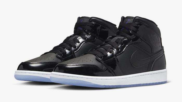 How to lace Jordan 1 - Air Jordan 1 Mid "Space Jam" product image of black leather pair of sneakers with icy blue outsoles.