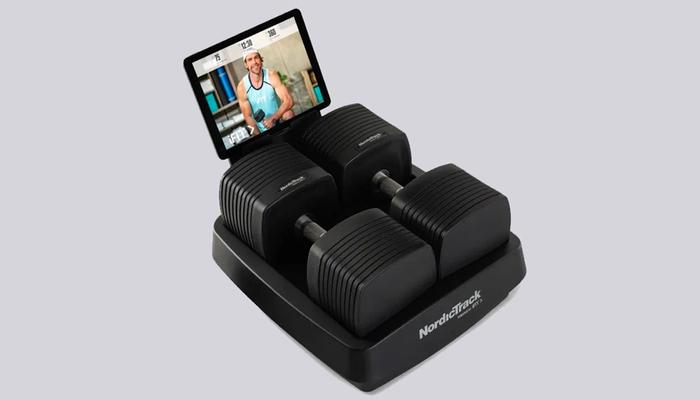Latest adjustable dumbbell news NordicTrack product image of a black set of voice-controlled dumbbells.
