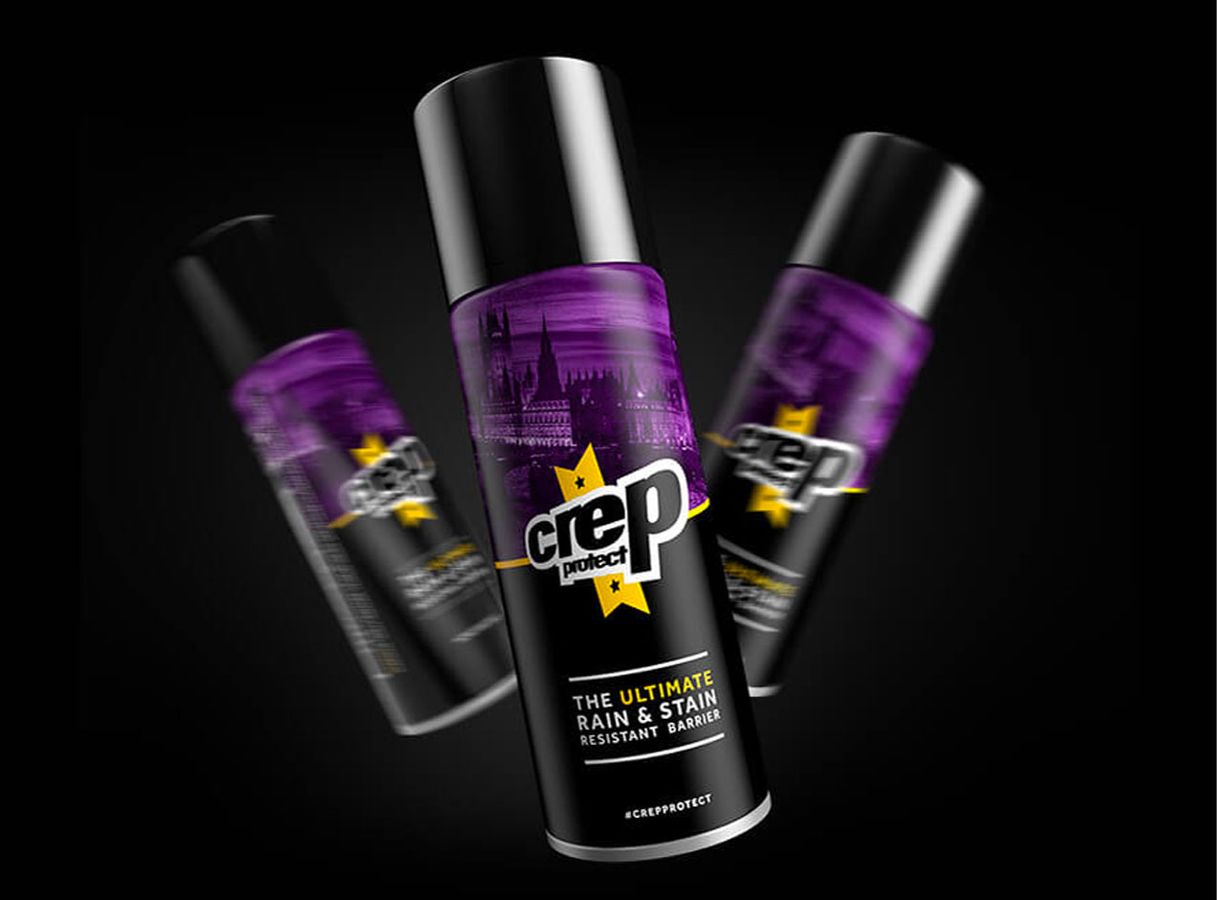 Crep Protect product image of a purple and black shoe protective spray with yellow details.