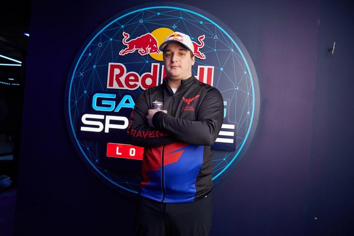 jukeyz posing in front of the red bull gaming sphere logo in london