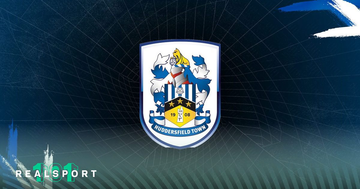 Huddersfield Town badge with blue background.