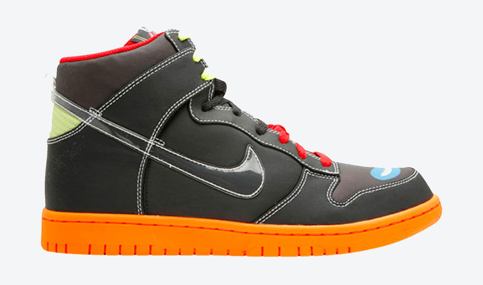 Nike Dunk High "Casette Playa" product image of a black sneaker with an orange midsole and red and yellow accents.
