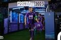 Image of a team dressed in purple heading out of a stadium tunnel, all below white Football Manager branding.