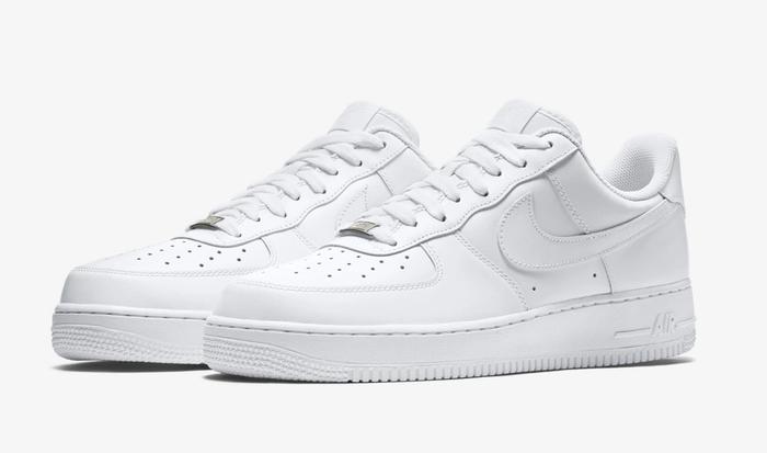Nike Air Force 1 product image of a pair of all-white sneakers.