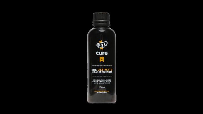 Best leather cleaner for shoes - Crep Protect Cure product image of a black bottle with white and yellow branding.