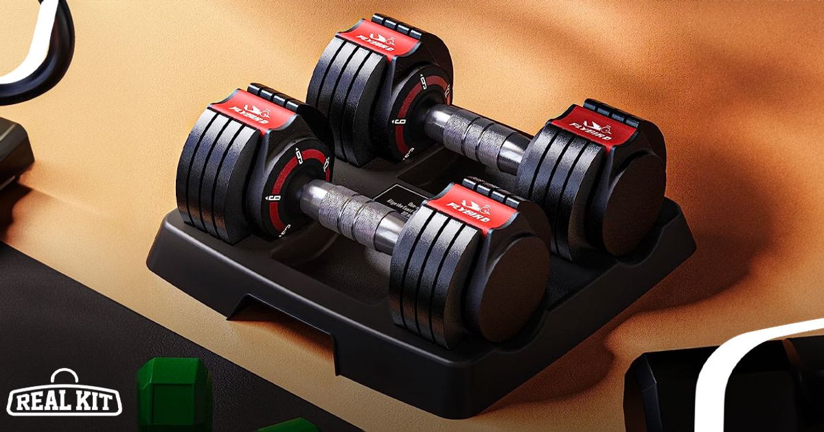 Image of a black and red pair of adjustable dumbbells on a wood floor.