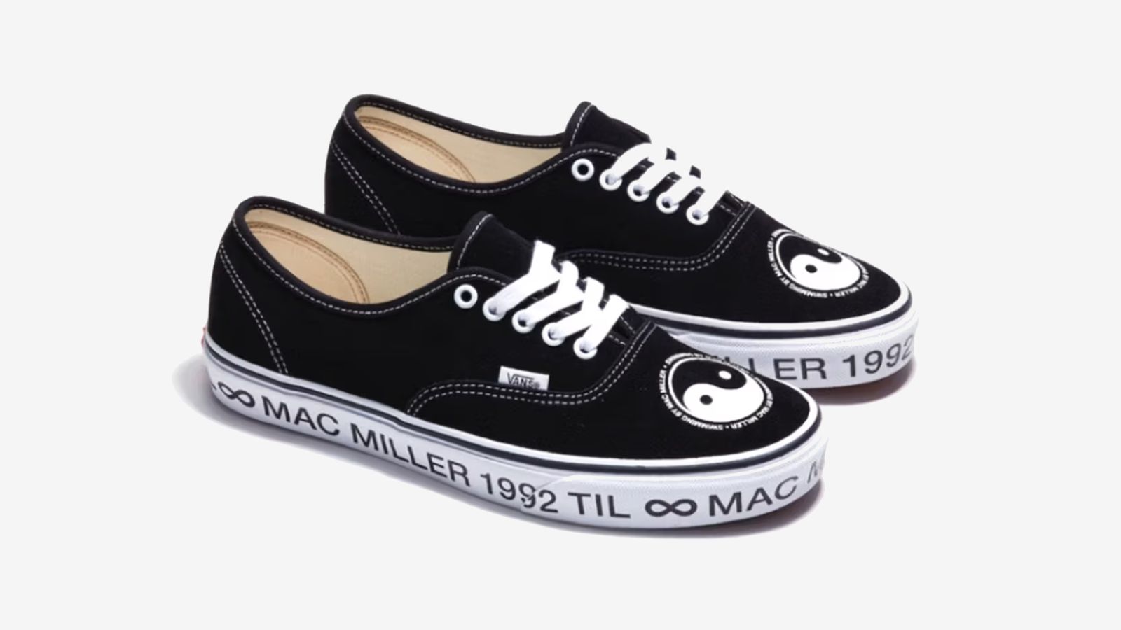 Mac Miller x Vans Authentic "Swimming" product image of a black pair of Authentics with white laces and sole, including Mac Miller branding across the midsole and a yin yang symbol on the toeboxes.