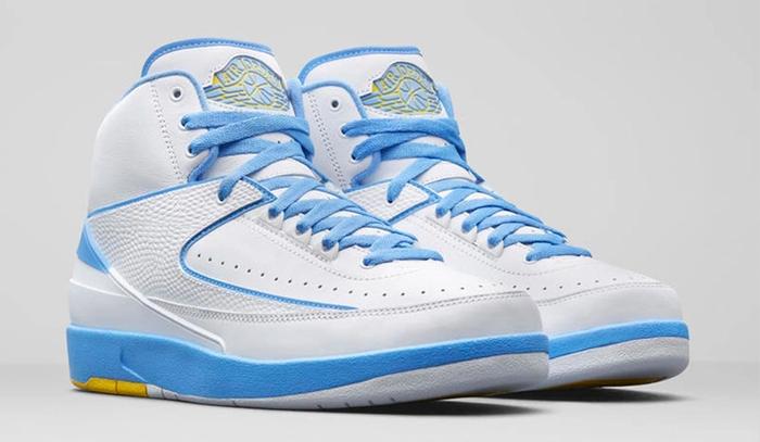 Best Air Jordan 2 colorways "Melo" product image of a pair of white sneakers with light blue and yellow accents.