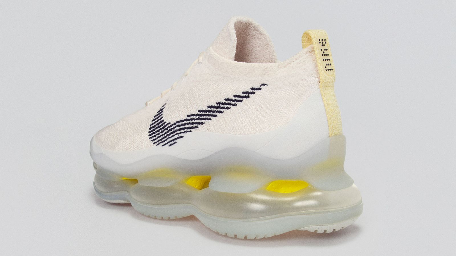Nike Air Zoom Scorpion product image of a light cream sneaker with large, translucent airbag midsoles.