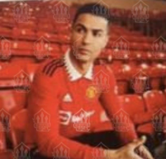 Manchester United Home Kit 2022/23 product image of red shirt worn by Ronaldo with a white and black collar.