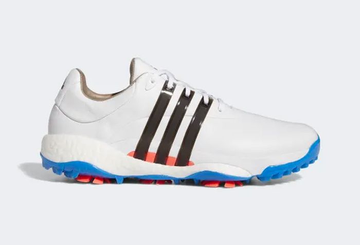 Best golf shoes adidas product image of a white pair of golf shoes with blue, black, and orange details.