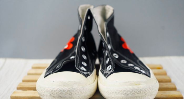 Converse product image of a pair of unlaced high-tops.