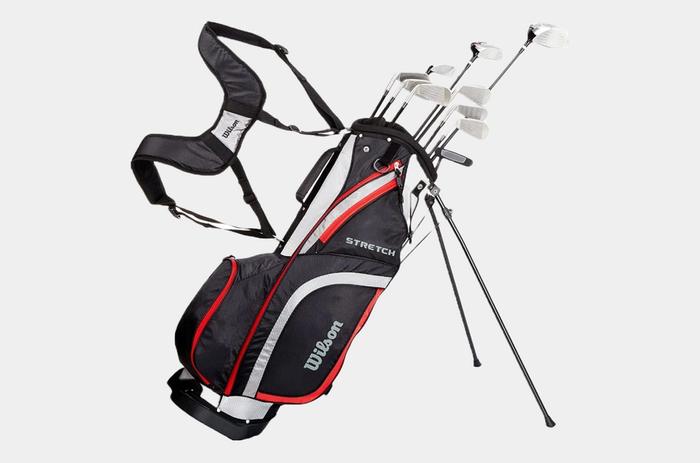Best golf clubs Wilson product image of a complete set of clubs in a black, white, and red golf bag featuring a stand.
