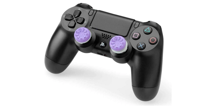 Everything you need for Call of Duty Vanguard KontrolFreek product image a PS4 controller with the joystick extensions attached.