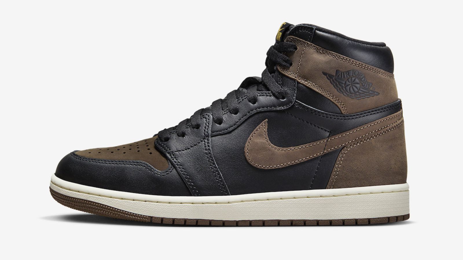 Air Jordan 1 High "Palomino" product image of a black leather and brown nubuck high-top with a cream white midsole.