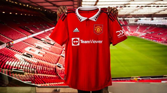 Manchester United adidas home kit product image of a red shirt with a white collar.