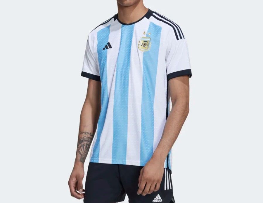 Argentina 2022 home kit product image of a white and blue striped kit with black accents.