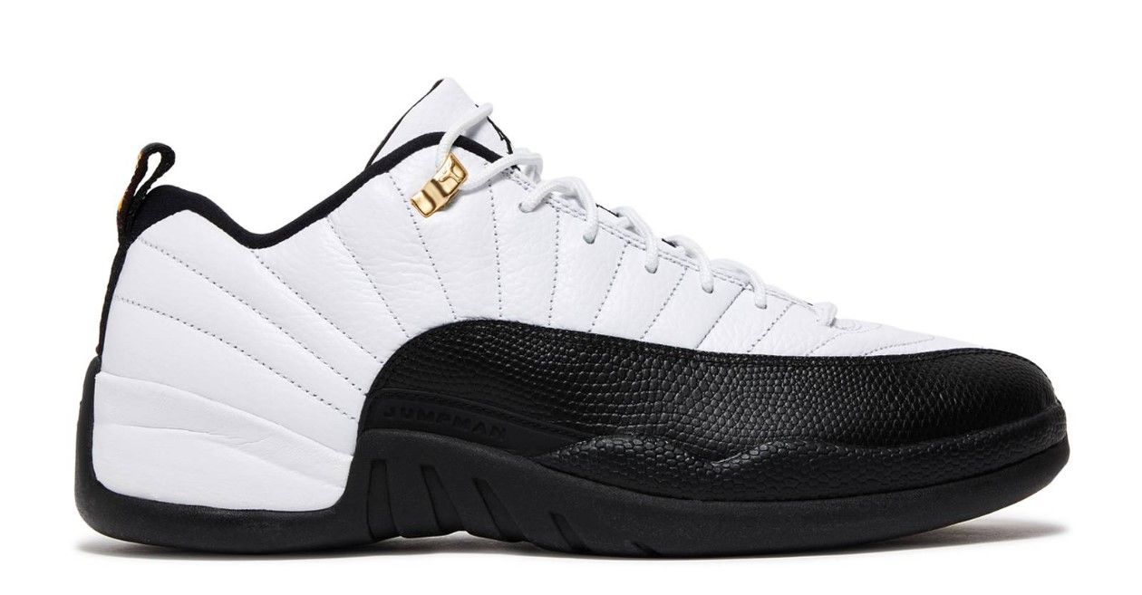 Air Jordan 12 Retro Low "Taxi" product image of a white and black sneaker with gold eyelets.