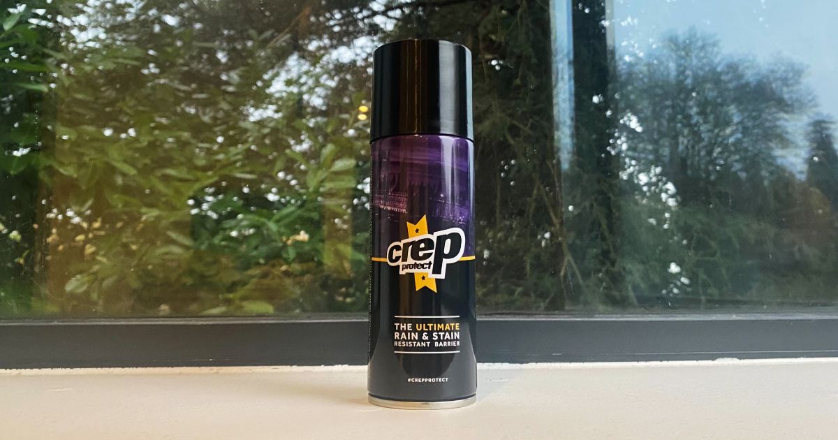 A black and purple spray can featuring yellow trim around Crep Protect branding on the front.