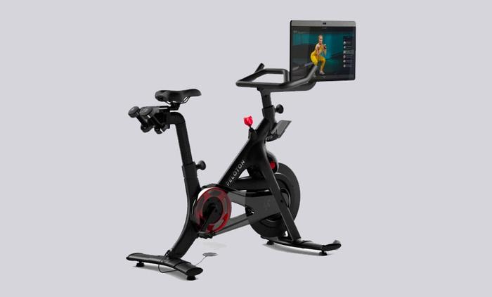 Best Exercise Bike Peloton product image with belt drive system and rotating HD screen