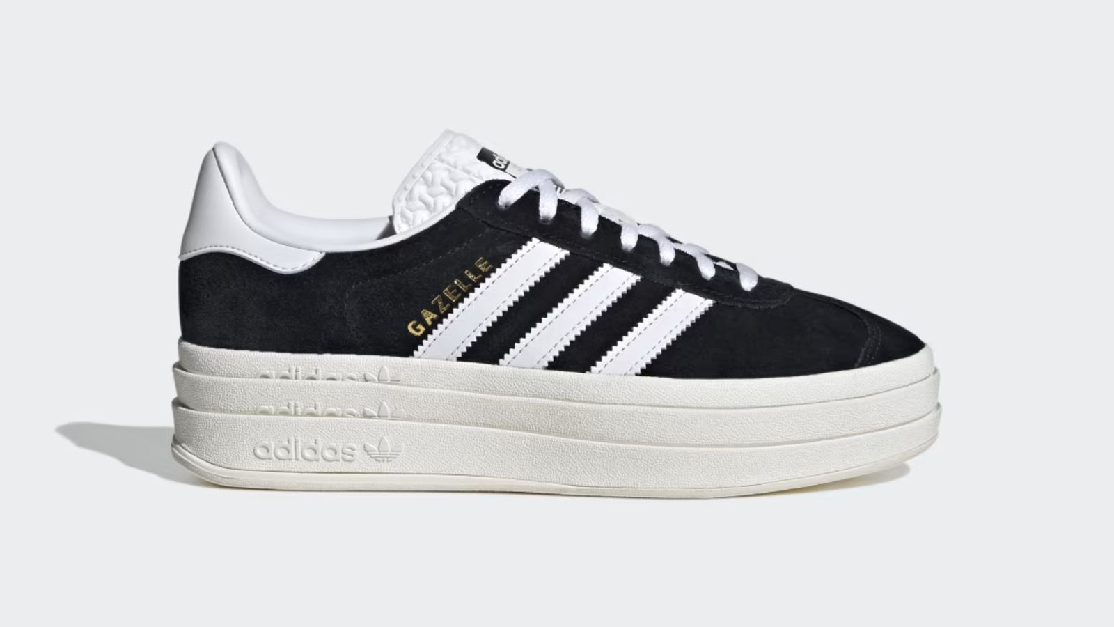 adidas Gazelle Bold "Core Black" product image of a black low-top featuring a white heel, laces, and side-stripes, plus a triple-stacked sole.