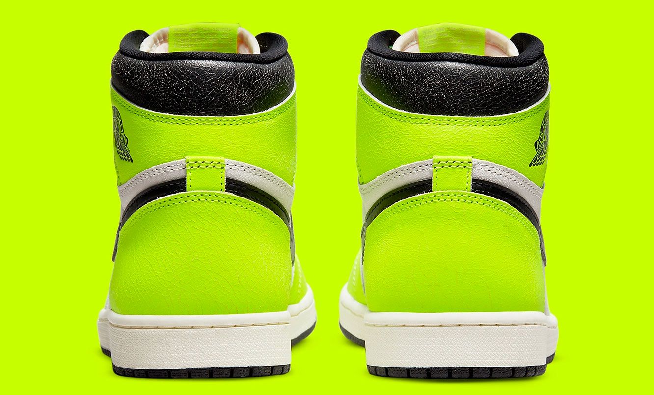 Air Jordan 1 High OG "Visionaire" product image of a white and black sneaker with neon yellow overlays. 