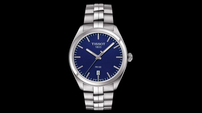 Best watches under 1500 Tissot product image of a stainless steel watch with a navy blue face.