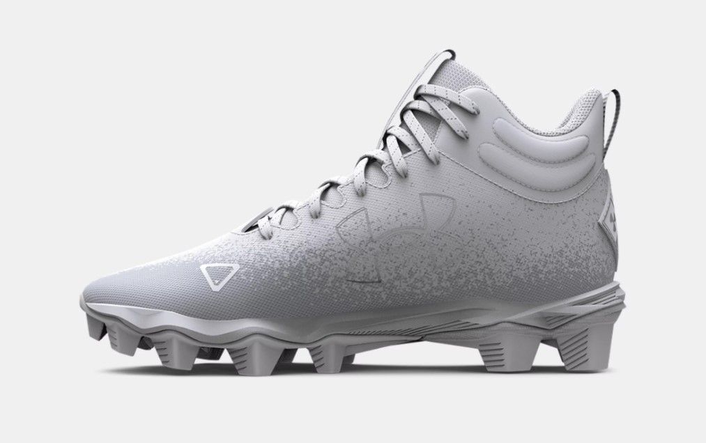 Under Armour Spotlight Franchise RM 2.0 Jr. product image of an all-white and grey mid-top youth cleat.