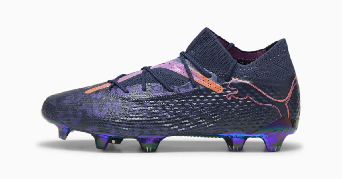 PUMA FUTURE 7 ULTIMATE product image of a dark navy and purple knitted football boot featuring lighter purple and orange trim.