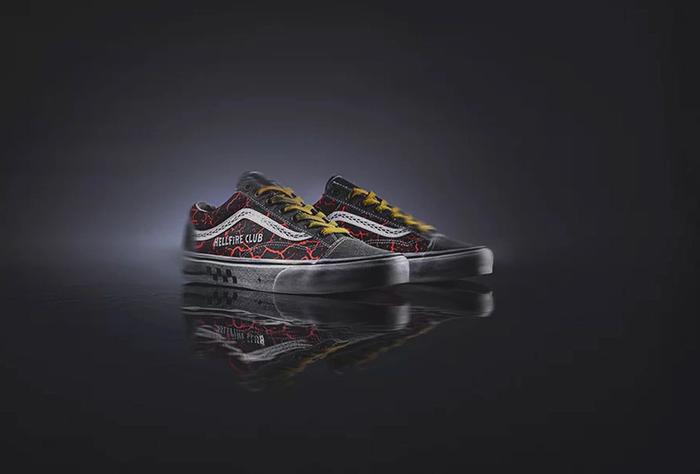 Stranger Things x Vans Old Skool product image of a black sneaker with white soles and "Hellfire Club" details.