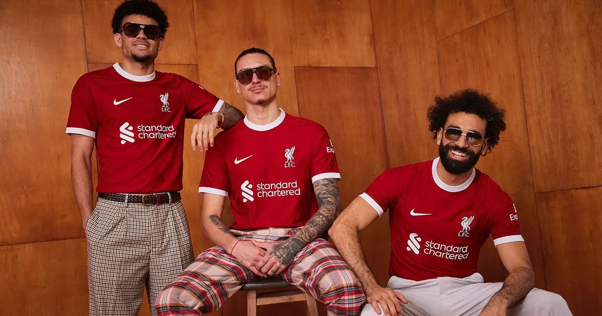 Diaz, Núñez, and Salah, all in sunglasses, wearing red Liverpool kits with white branding and trims.