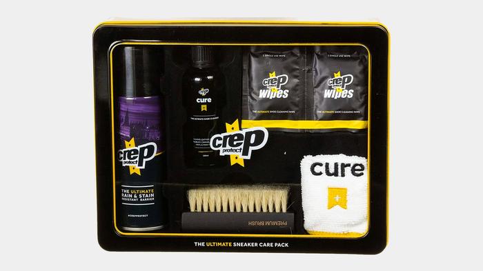 Best shoe cleaning kit - Crep Protect product image of a black metal tin containing Cure shoe cleaning products plus a white cloth.