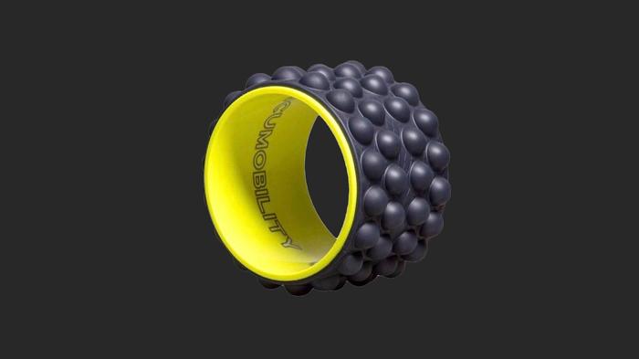 Best foam roller Acumobility product image of a thin, black roller with a yellow interior.