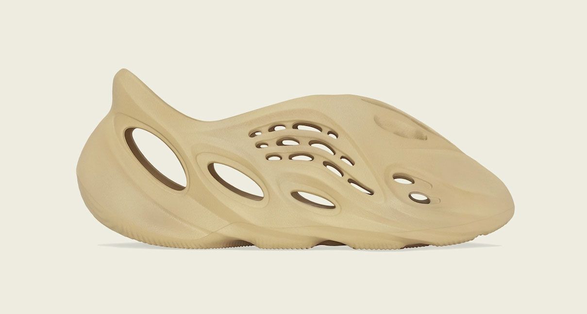 Best Yeezys Foam RNNR "Desert Sand" product image of a sand-coloured slip-on sneaker.