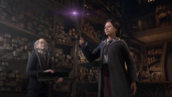 hogwarts legacy screenshot featuring a student in Ollivander's wand shop 