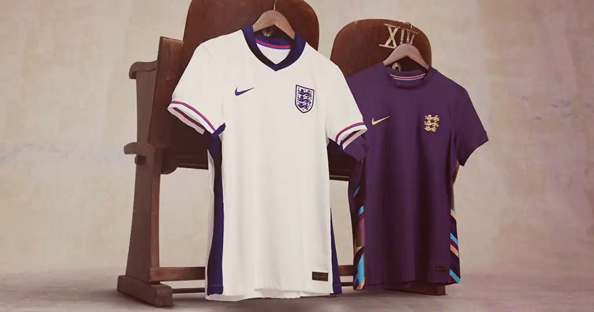 A white England shirt with navy and red trim next to the purple and gold Nike away strip.