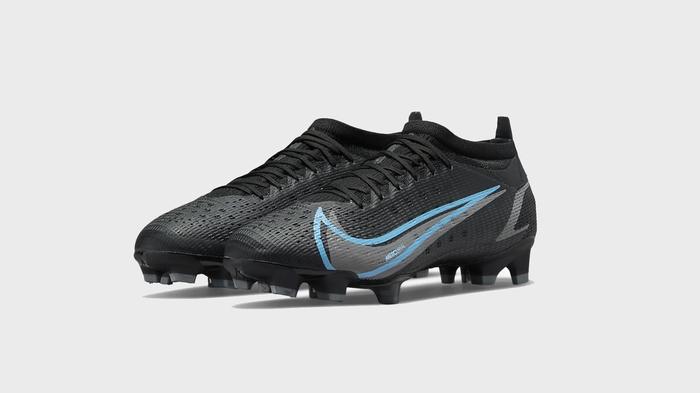 Best football boots under 100 Nike product image of a pair of black boots with blue and grey details.