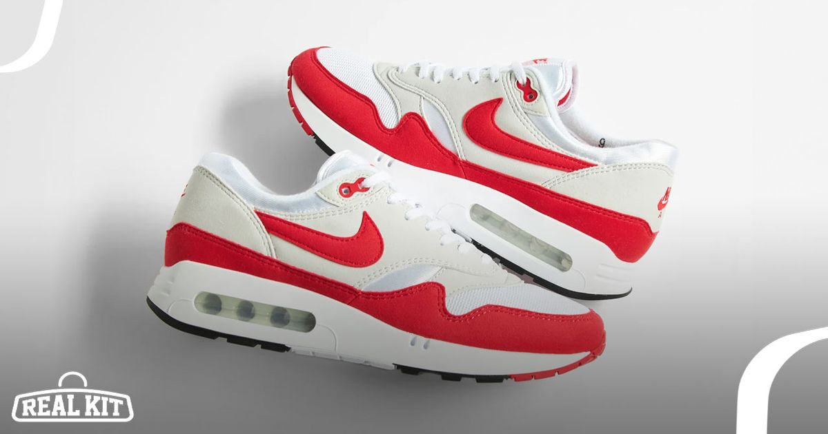 A pair of white, grey, and red "Big Bubble" Air Max sneakers laying on their side on top of each other.