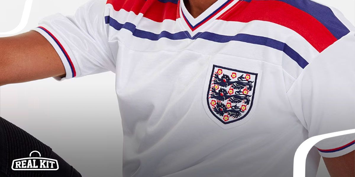 Image of a white England kit featuring blue and red shoulder stripes across the top.