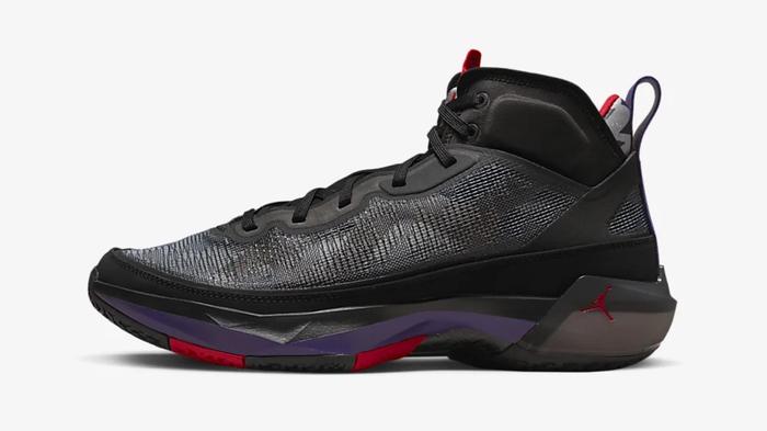 Best Jordan for basketball - Air Jordan XXXVII product image of a black sneaker with red and purple details.