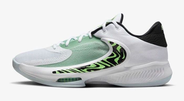Best basketball shoes Nike product image of a white shoe with black and barely volt green accents.